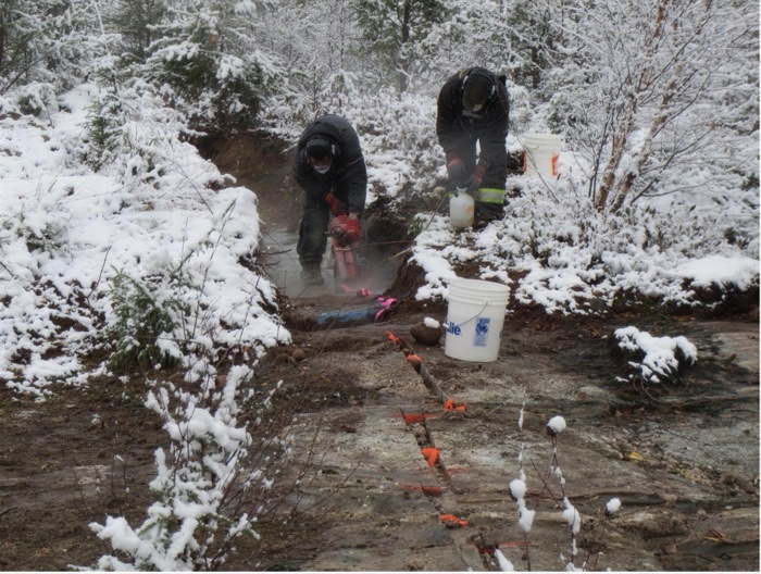 Field crew channel sampling at the Wenasaga Zone