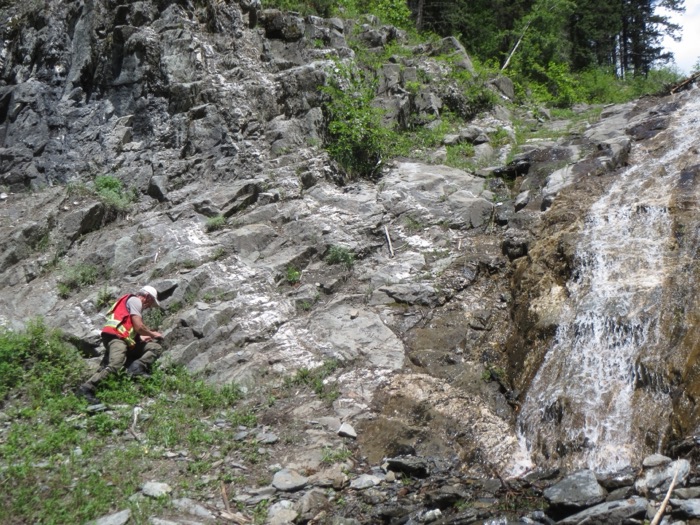 Mapping the exposed rock face beside the waterfall, Rare One Project